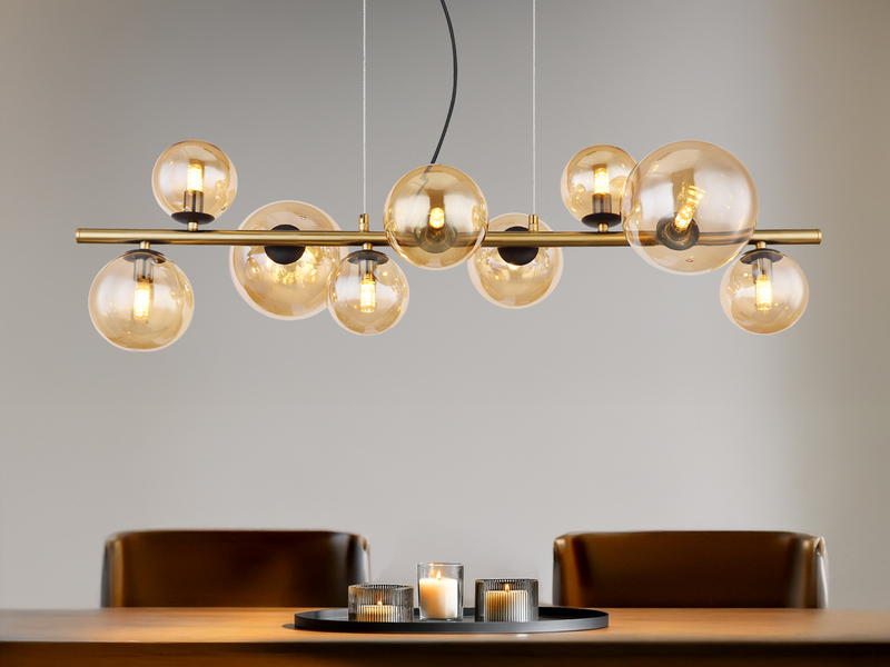 Pendelleuchte RIHA Messing-Schwarz 9-flammig mit Glaskugeln Bernstein, B: 87cm
